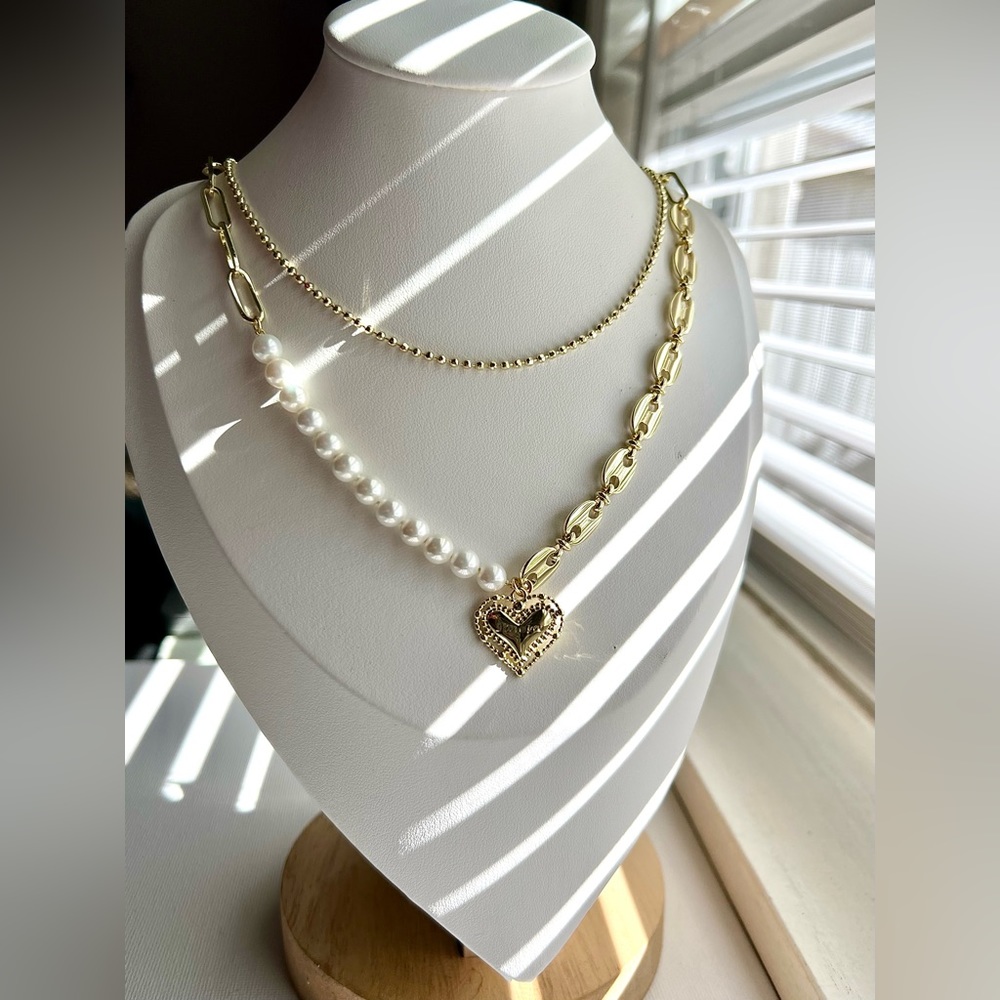 Double drop chain various types of links. 14k Laminated Gold. Clamp closure.